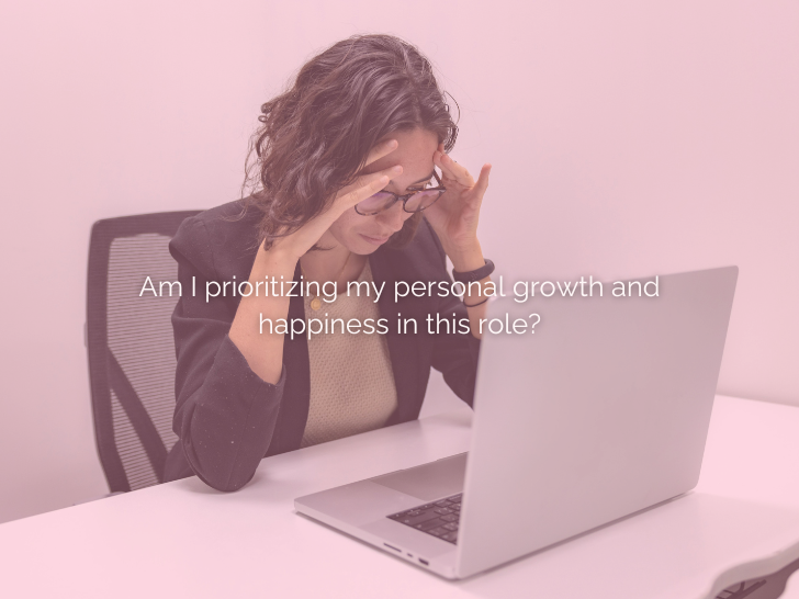 women sitting at desk with laptop, head in her hands. Text overlaying reads: Am I prioritizing my personal growth and happiness in this role?